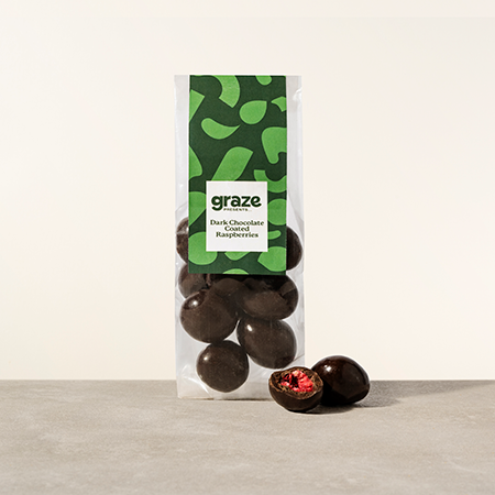 A packet of Graze dark chocolate coated raspberries