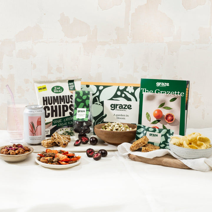 Graze Presents 'a garden in bloom' box contents laid out on a plain white surface